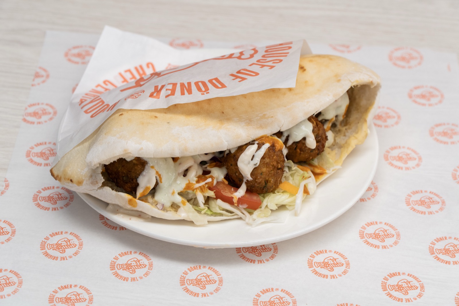 Falafel in homemade pita on House of Döner branded paper