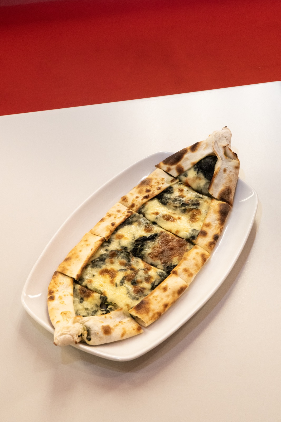 Spinach pide, Turkish flatbread pizza